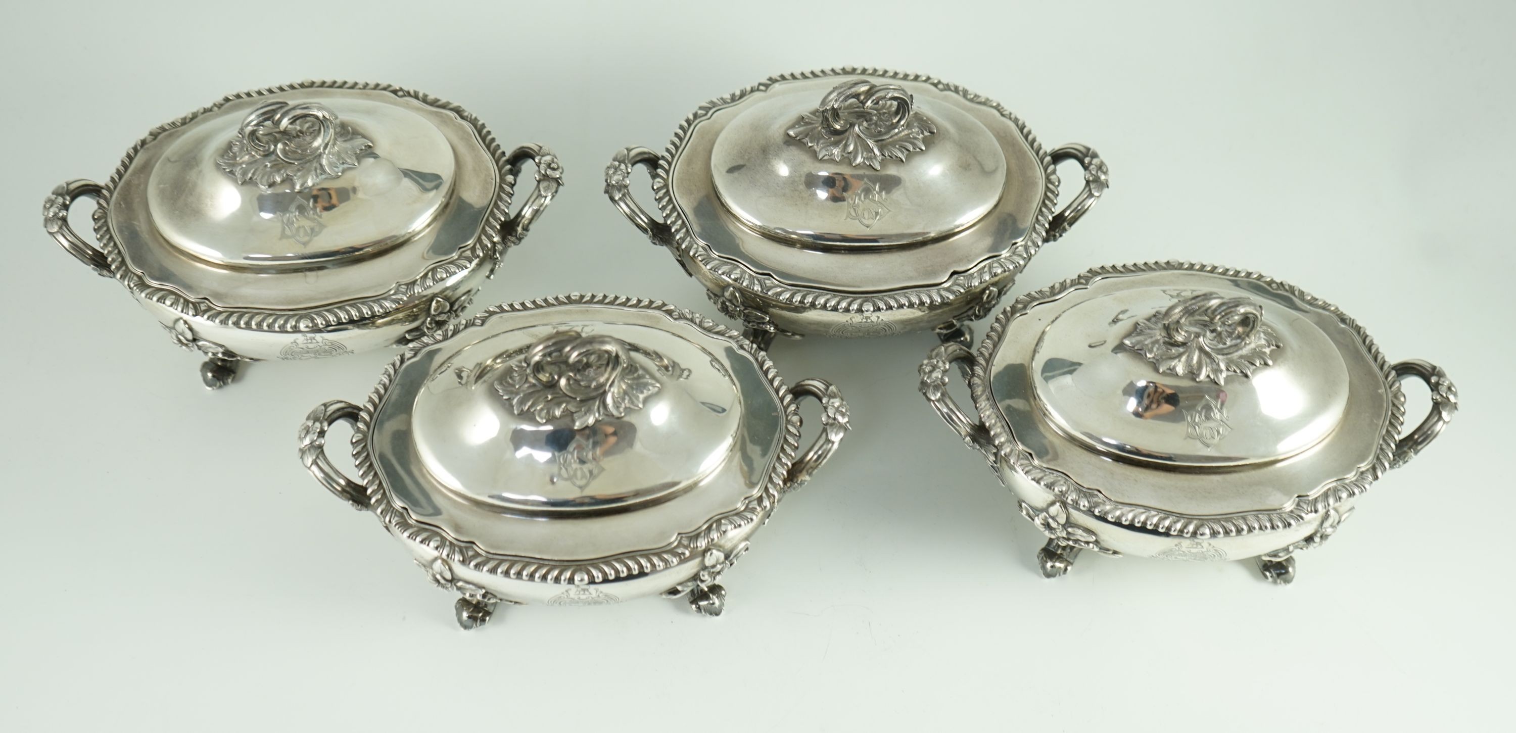 Benacre Hall, Suffolk. A good set of four Victorian silver two handled oval sauce tureens and covers, by Edward & John Barnard